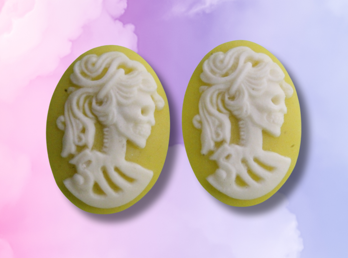 Oval-Shape which is in Yellow with intricate Skeleton Lady image from shoulders up